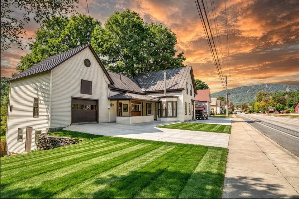 The Bear's Den at 56 Main Street, Ludlow, Vermont: exterior at golden hour